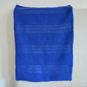 Läs mer om artikeln Virkad blå liten bebisfilt